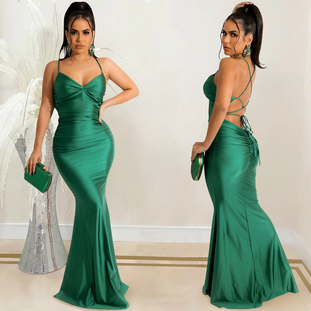 Front and back views of an adult model wearing the Emerald After Dark green satin maxi dress