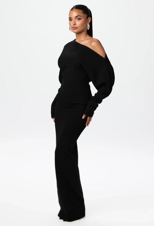 Adult model wearing the black Shoulder Kiss Column Dress, full-length front view.
