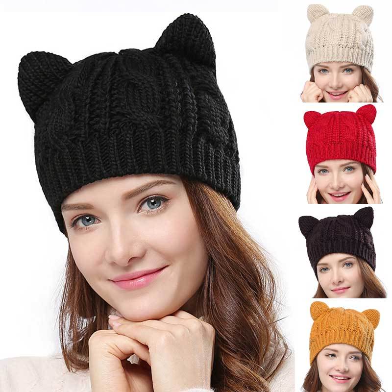 Kitty Club cat-ear knit beanie shown in black, beige, red, purple, and yellow