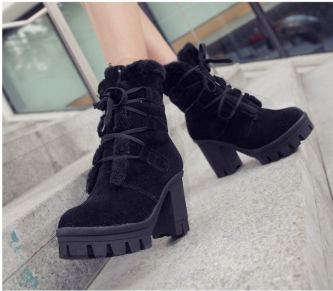 Black Cold Front Plush Heel Boots worn close up showing plush lining, laces and chunky heel