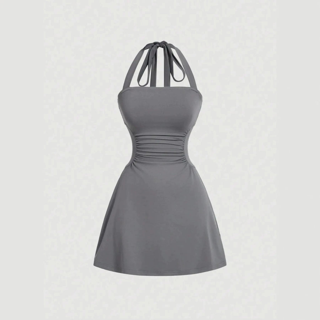 Solid dark-gray A-line mini dress with ruched waist and tie-back halter straps, front product view.