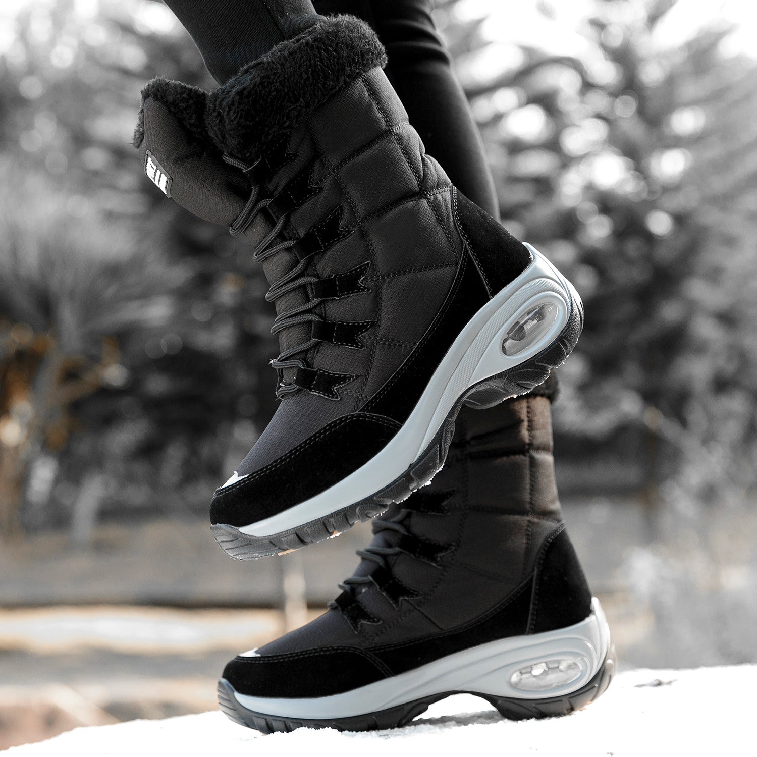 Snow Angel Platform Boots supplier reference view 3 showing black, red and white quilted snow boots with plush black cuffs, black laces and platform soles
