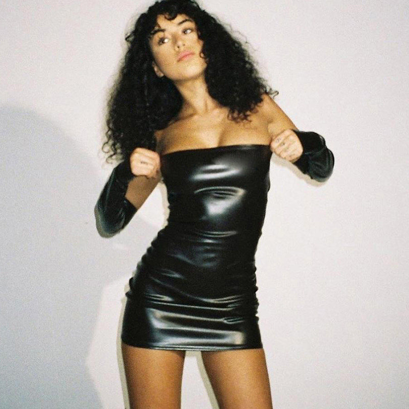 Adult model wearing the black glossy-look strapless mini dress on a light studio background; gloves are styling accessories and are not included.