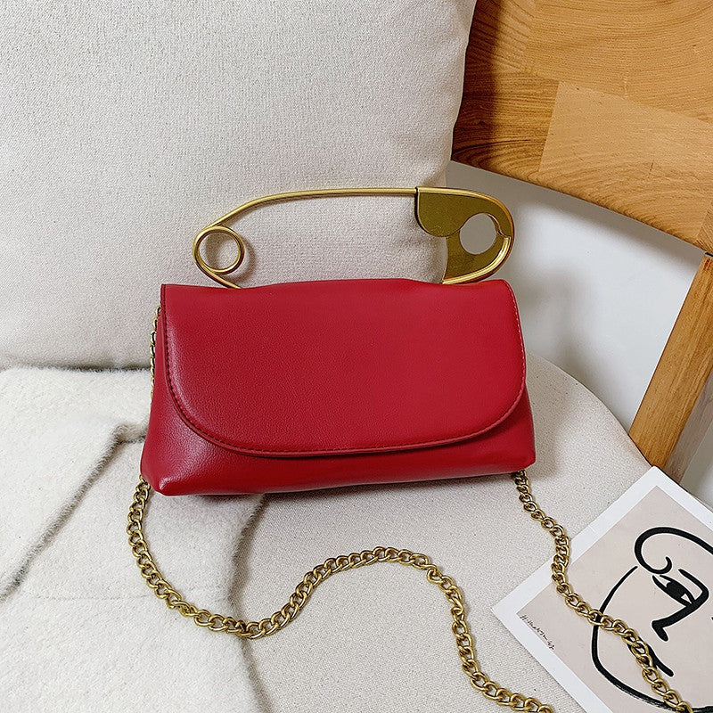 Red Power Move Top-Handle Bag with gold-tone handle and chain strap, front view