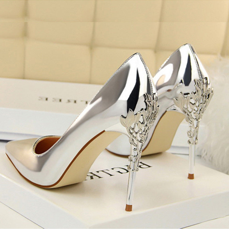Silver Boardroom Pointed Stiletto Heels rear three-quarter view with silver filigree heel detail