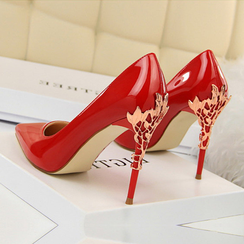 Red Boardroom Pointed Stiletto Heels rear three-quarter view with matching filigree stiletto heel