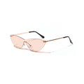 Gilded Wing brown rimless cat-eye sunglasses with gold-tone arms, front angle on white