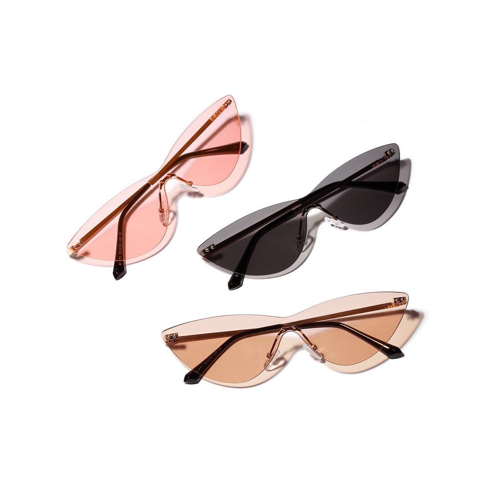 Rimless cat-eye sunglasses shown in pink, black and brown on a white background