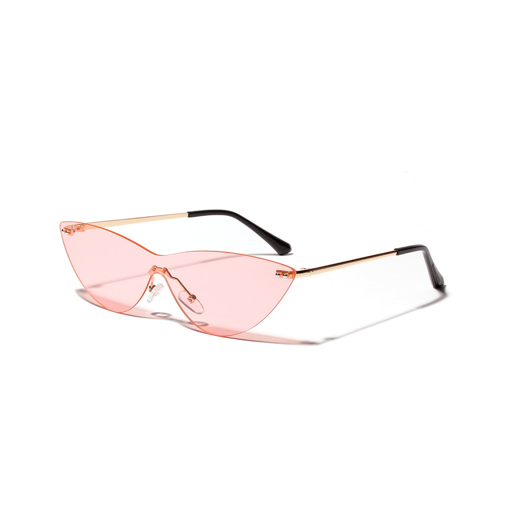 Pink rimless cat-eye sunglasses with gold-tone metal arms on a white background