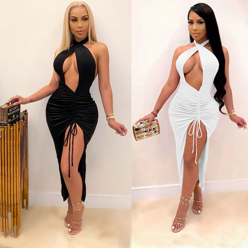 Adult models wearing the black and white Midnight Control Halter Cutout Maxi Dress, front views.