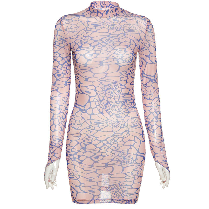 Supplier full-length view of the After Hours Illusion Mini Dress showing the fitted waist and mini hem.