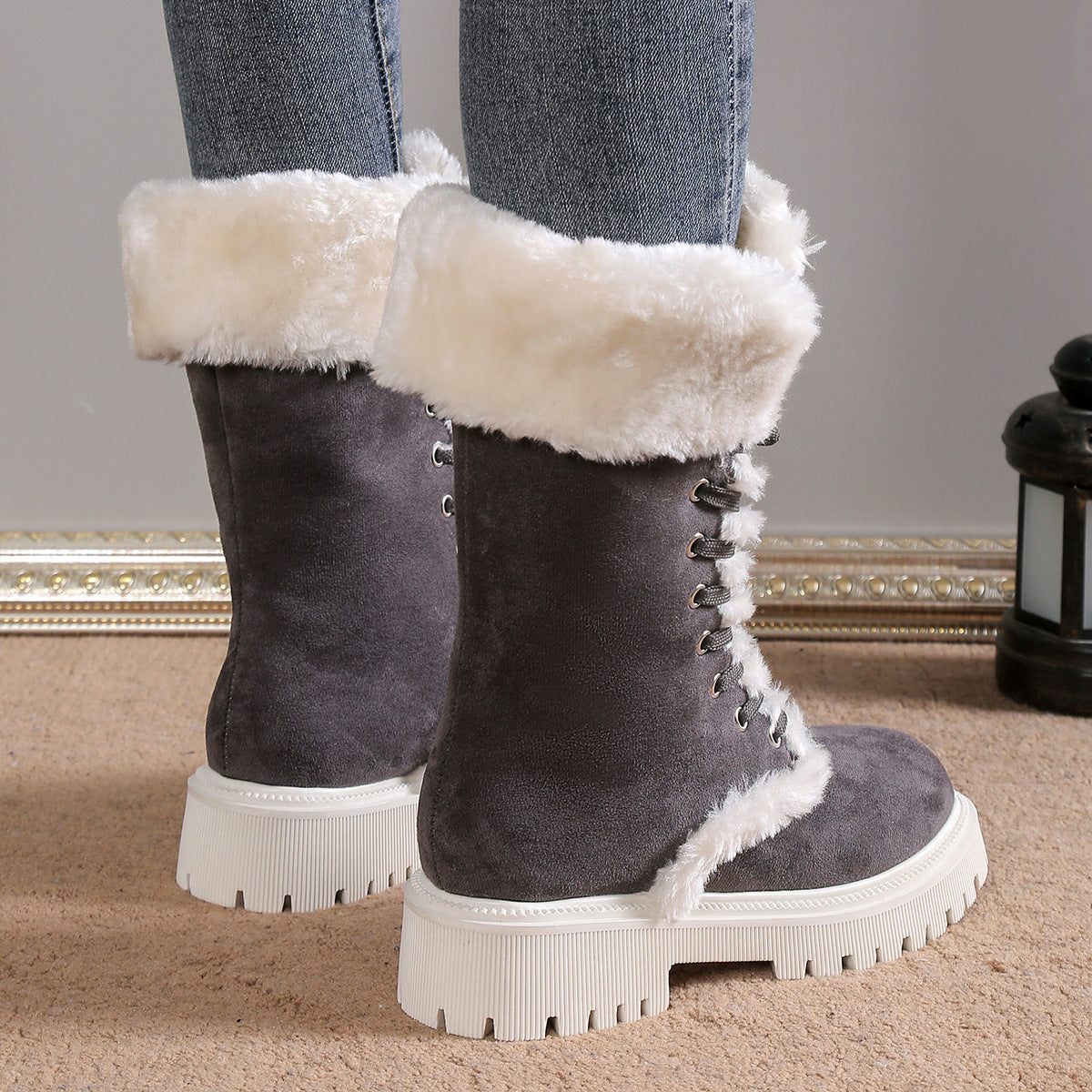 Grey Frost Kiss Lace-Up Boots shown from the rear with plush cuffs and contrast lug soles.
