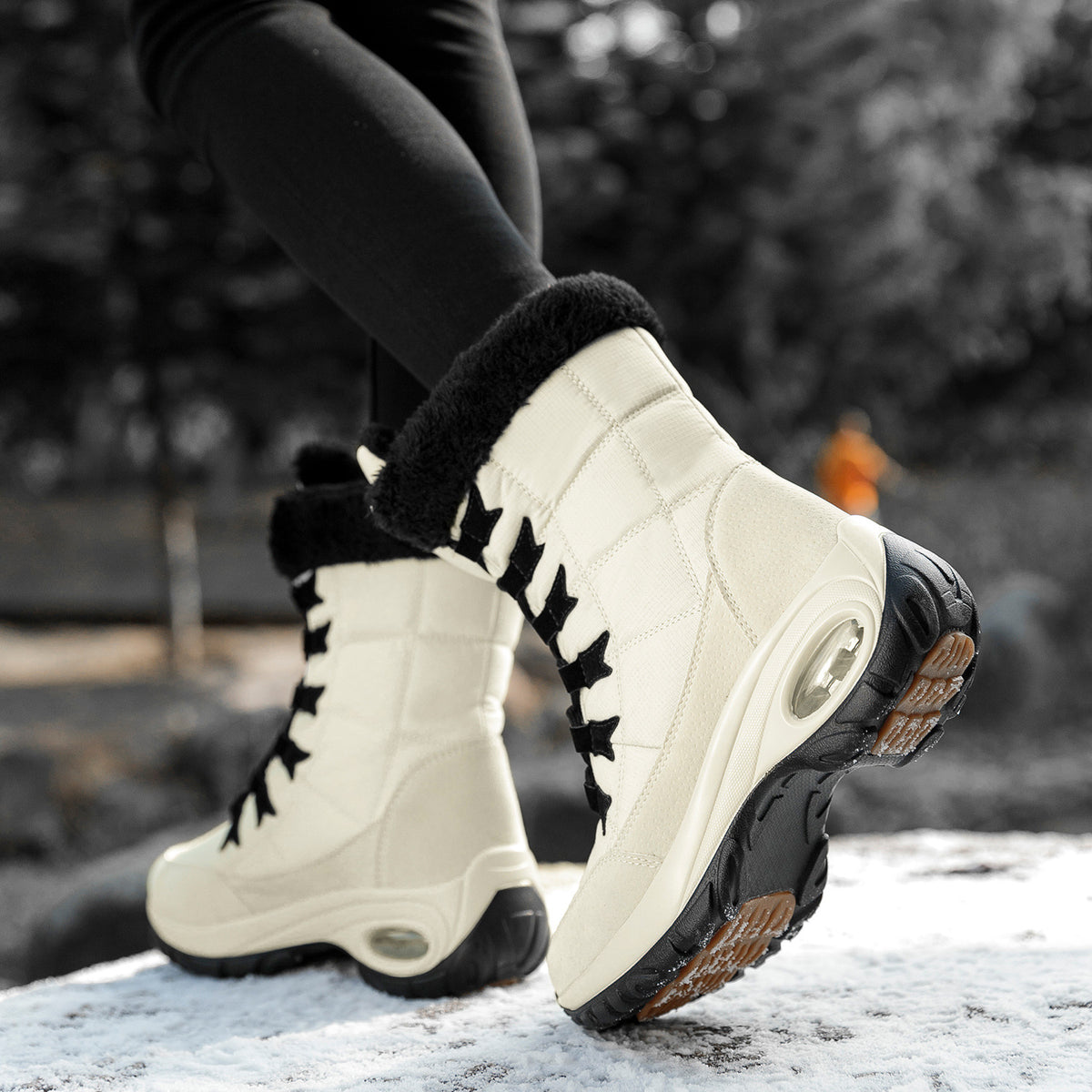 Snow Angel Platform Boots supplier reference view 1 showing black, red and white quilted snow boots with plush black cuffs, black laces and platform soles