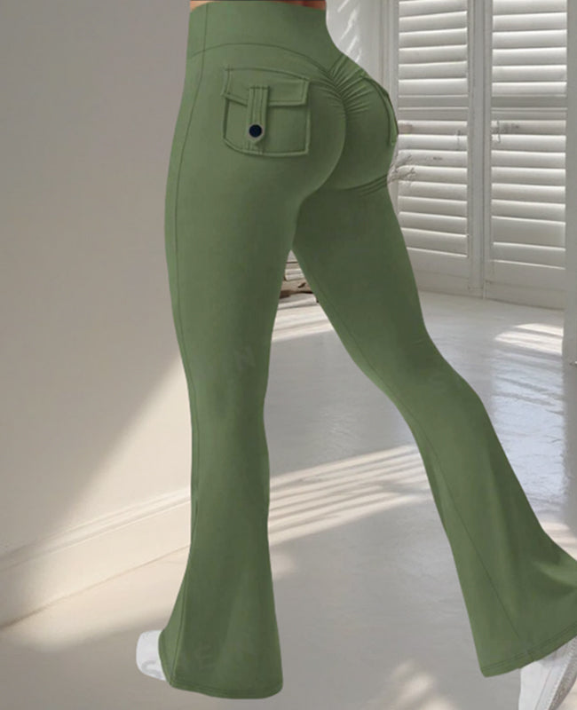 Green high-waisted flare pants showing the ruched back and buttoned flap pockets.