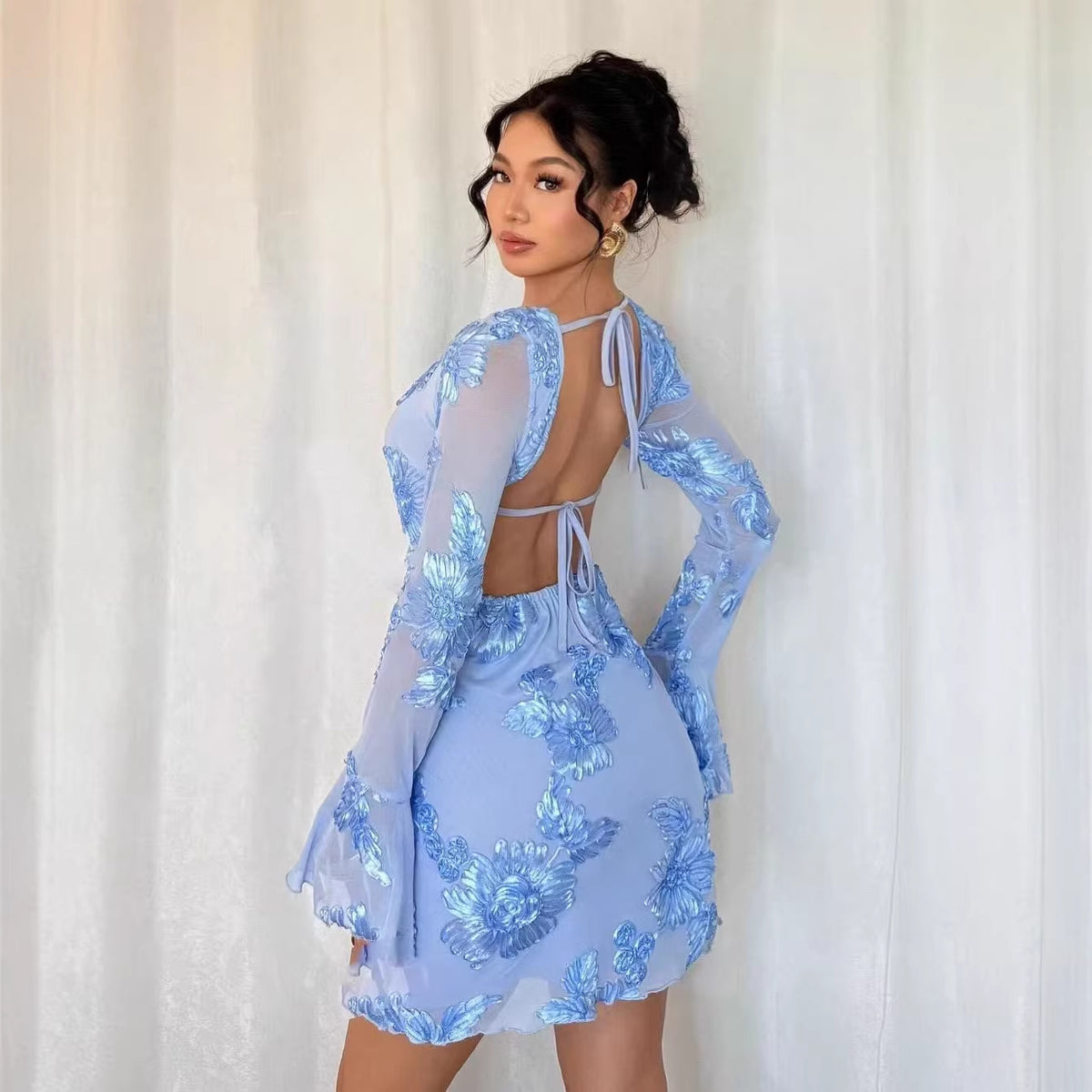 Blue Bloom Fantasy Mini Dress back view showing the open back and two separate tie closures