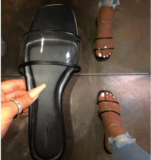 Clear Intent black square-toe slide with black footbed, clear vamp band, and slim black toe strap