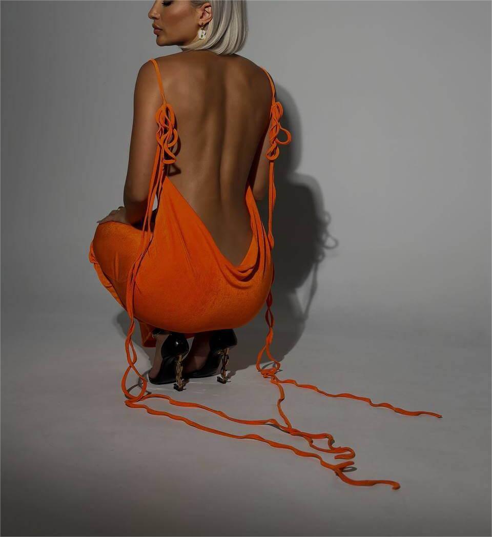 Penthouse Lace-Up Backless Maxi Dress supplier back view in orange red showing long shoulder ties