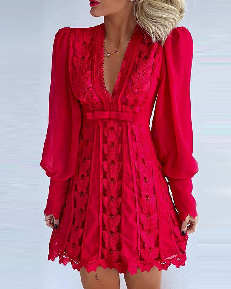 Private Suite Plunge Lace Mini Dress supplier front view in red showing the V neckline and long puff sleeves