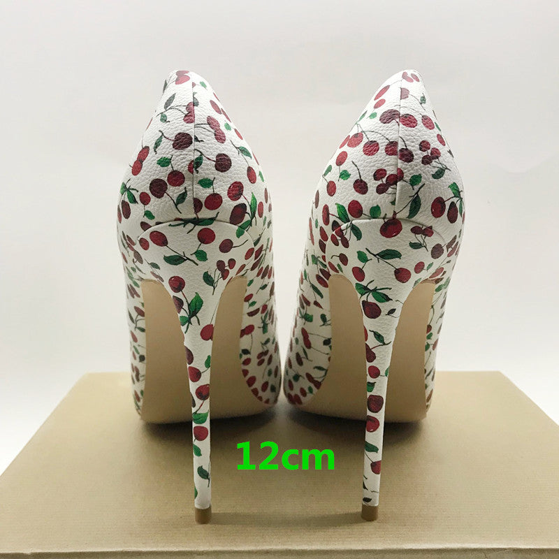 Cherry-print stiletto pump rear view showing wrapped heels