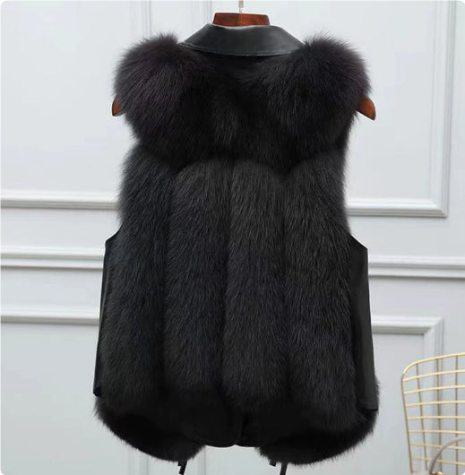 Black Soft Power Faux-Fur Vest back view on a wooden hanger.