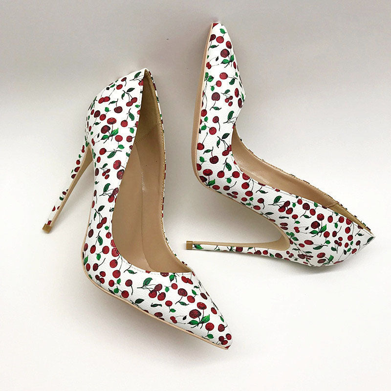 Cherry-print pointed-toe stiletto pumps shown from side angles