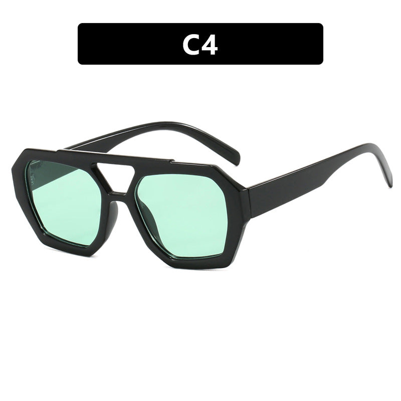 Glossy black oversized sunglasses with pale green lenses, supplier style C4.