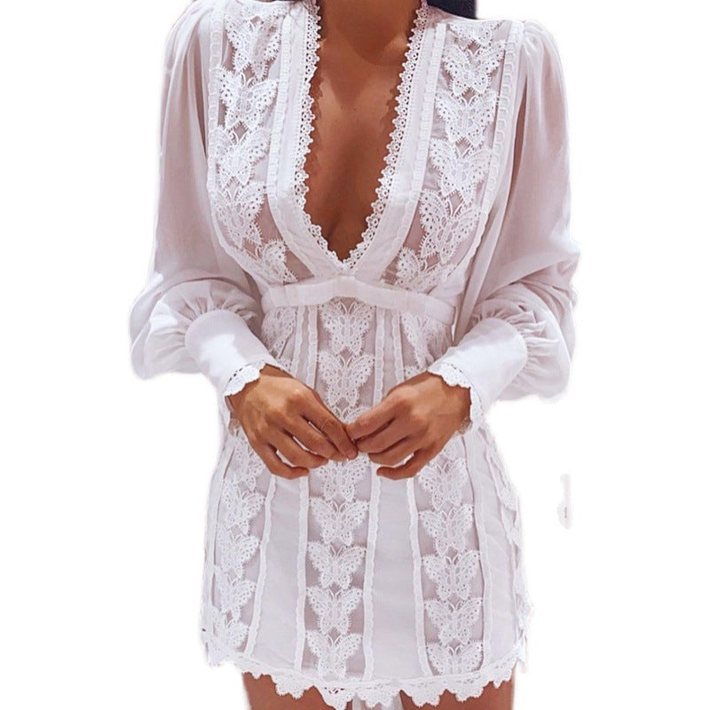 Private Suite Plunge Lace Mini Dress supplier white garment detail showing the floral lace and fitted cuffs