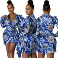 Blue abstract-print wrap mini dress shown from the front, side, and back