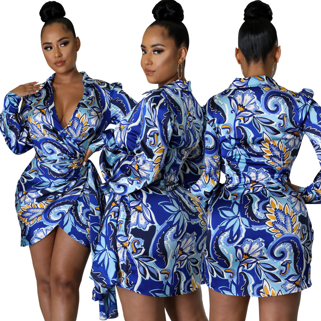 Blue abstract-print wrap mini dress shown from the front, side, and back