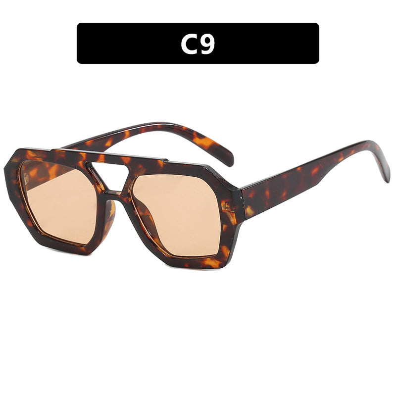 Floral tortoiseshell oversized sunglasses with light tea lenses, supplier style C9.