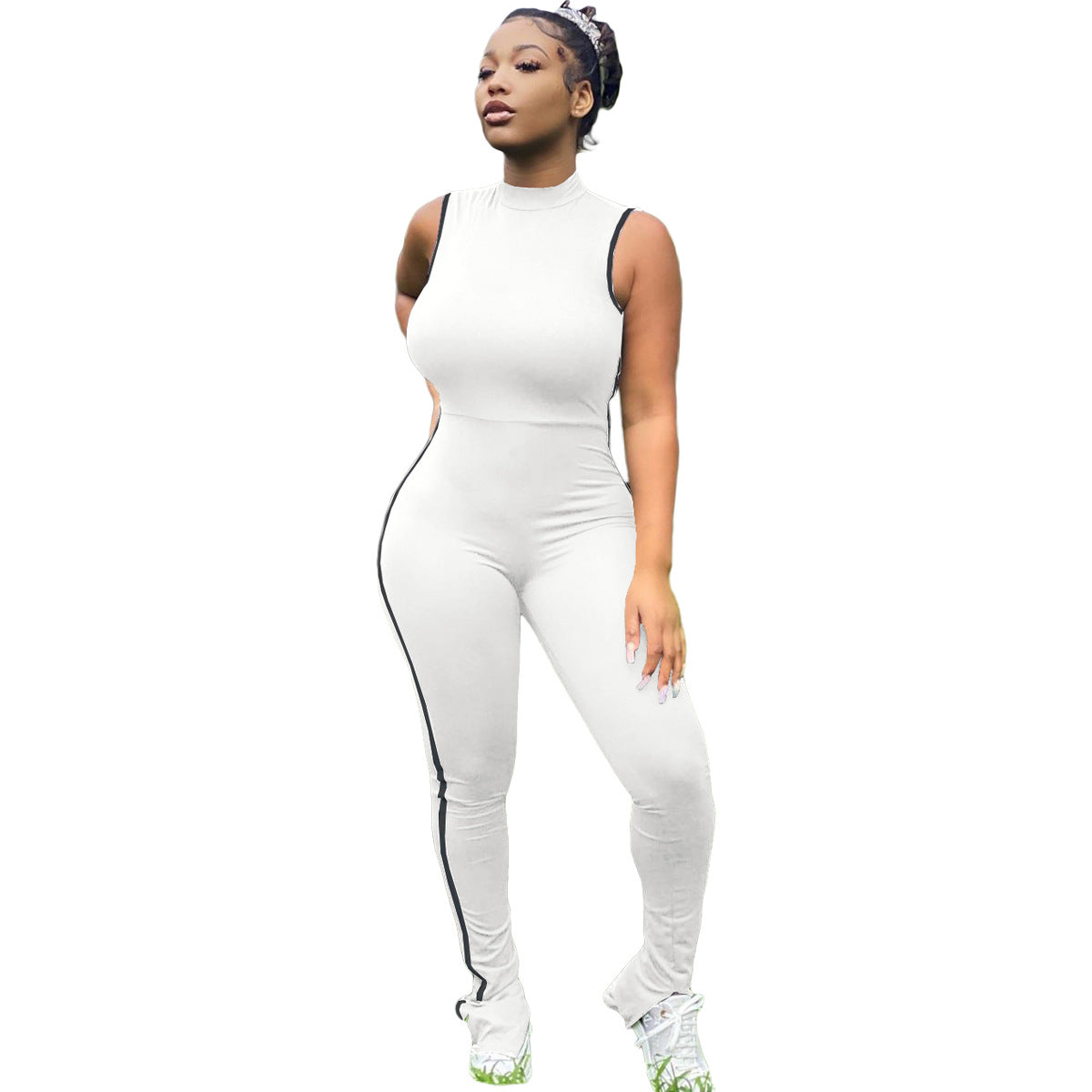 Adult model wearing the white Sculpt Mode striped sleeveless jumpsuit, front view