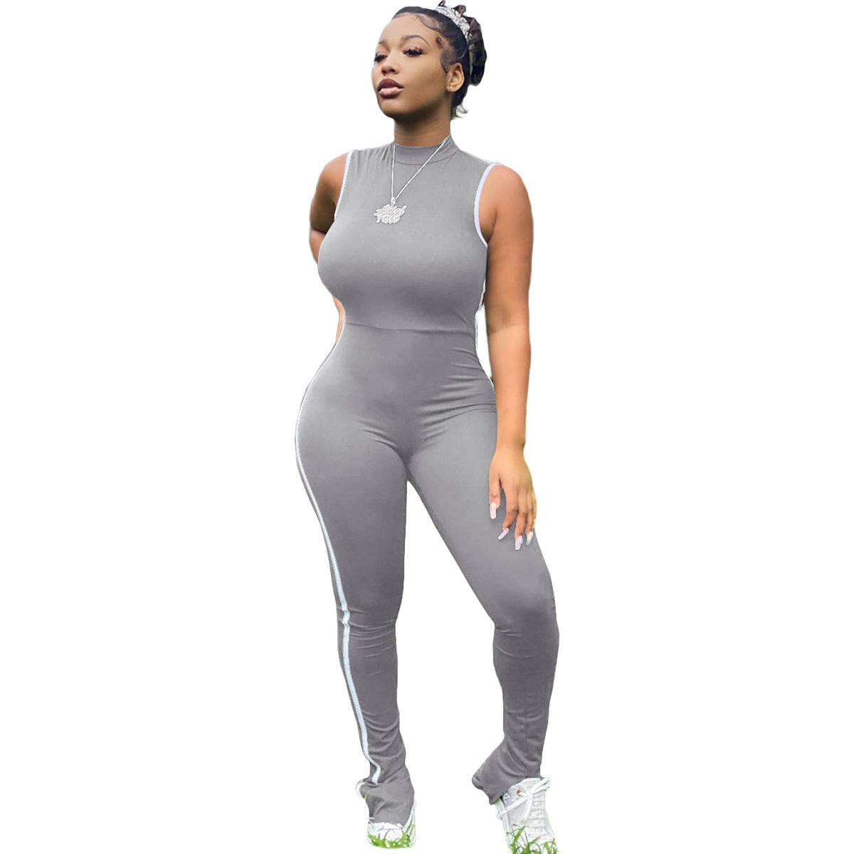 Adult model wearing the grey Sculpt Mode striped sleeveless jumpsuit, front view