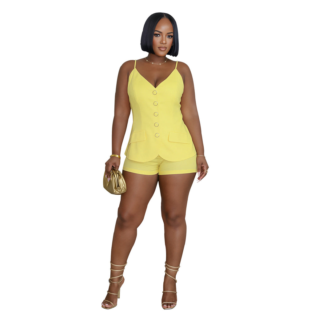 Model wearing yellow Boardroom Heat sleeveless button-front top and matching shorts, front view on white background