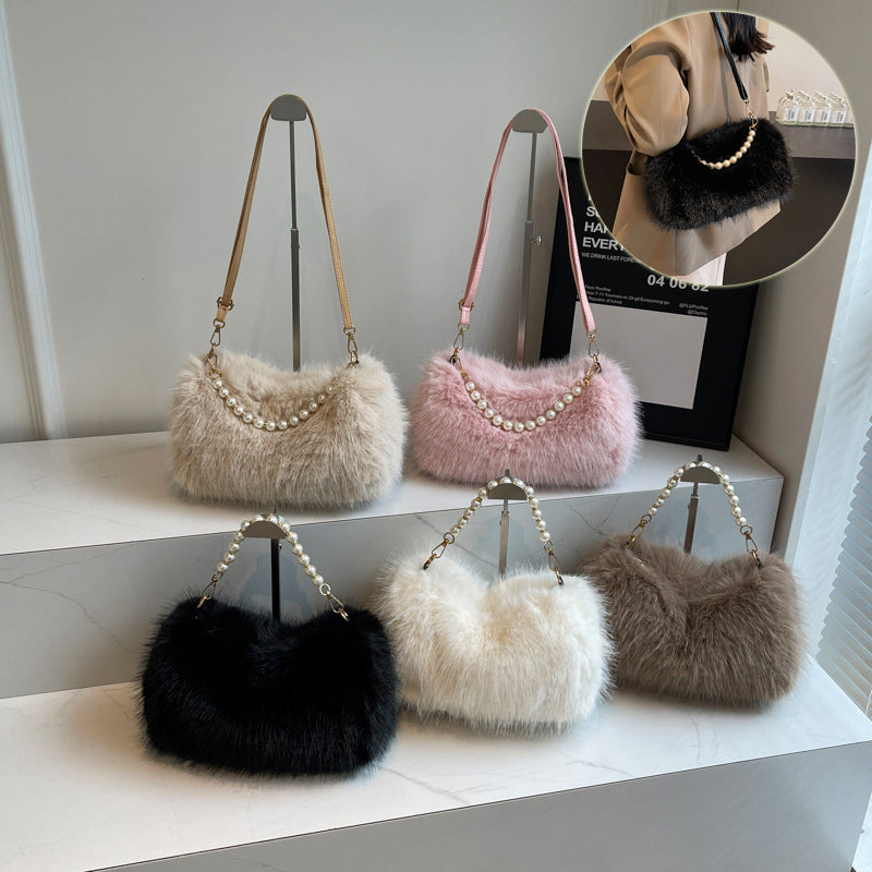 Black, beige, pink, white, and brown plush shoulder bags displayed together with pearl-style front rows and single straps.