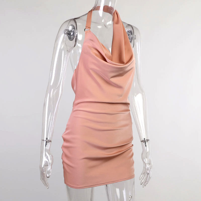 Full front view of the Champagne Hour pink satin halter mini dress on a clear mannequin