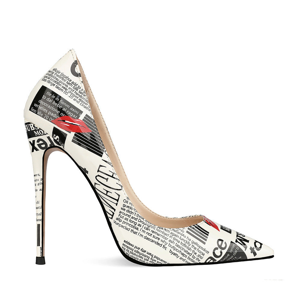 Headline newspaper-print pointed stiletto pump left side profile