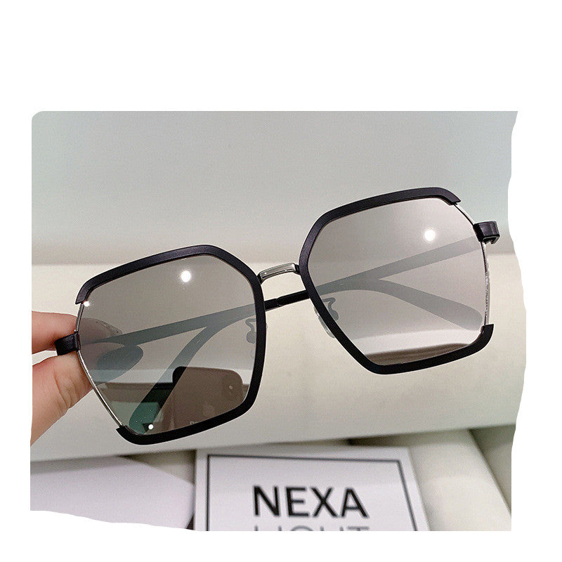 Top Floor Energy black frame sunglasses with mercury-style lenses