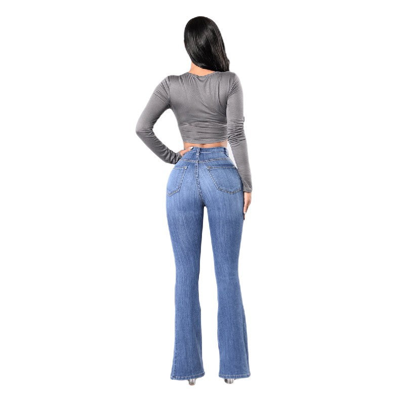 Modeled rear view of the Light Blue Big Energy Jeans showing the yoke and patch pockets.