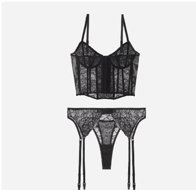 Black three-piece lace set with corset bra, underpants, and garter belt