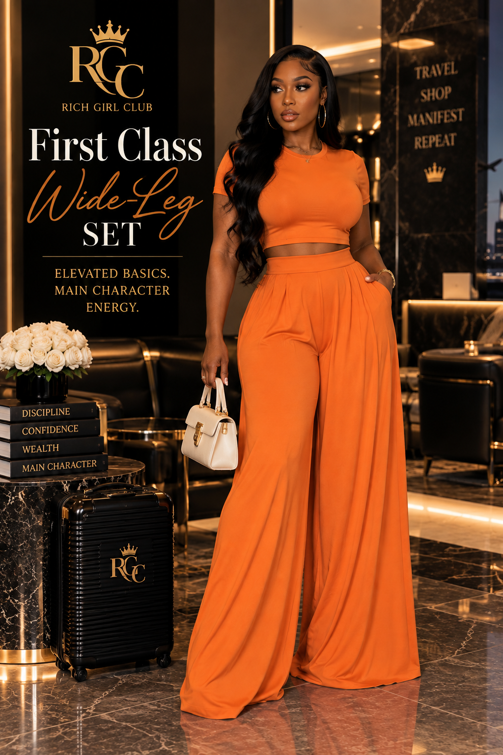 First Class Wide-Leg Set in orange on an adult model in an RGC luxury hotel campaign.