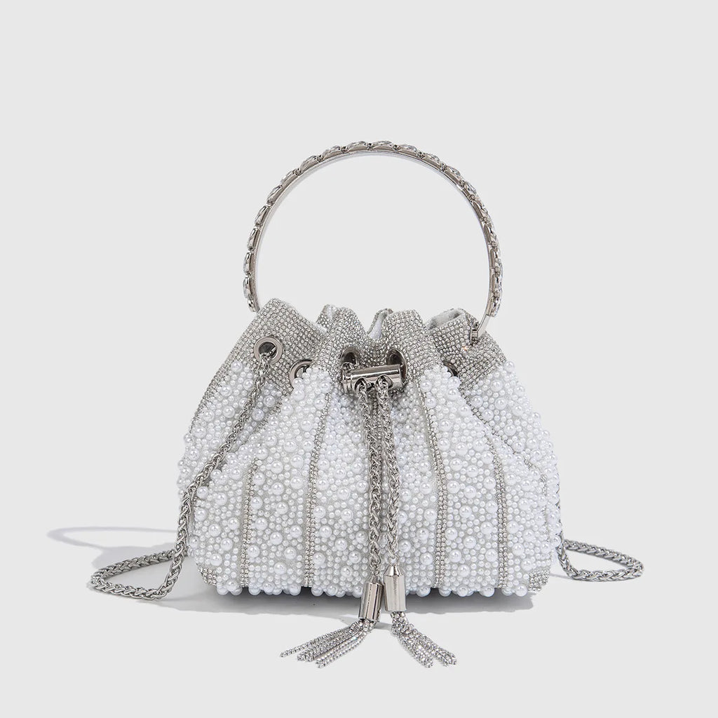 Main Character Rhinestone Clutch Silver design with white pearl panels, rhinestone strips, round handle, and chain strap