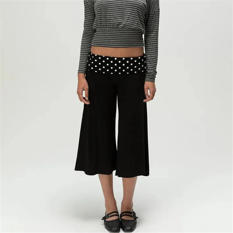 Solid black Uptown Wide-Leg Gauchos with black polka-dot fold-over waistband, front view