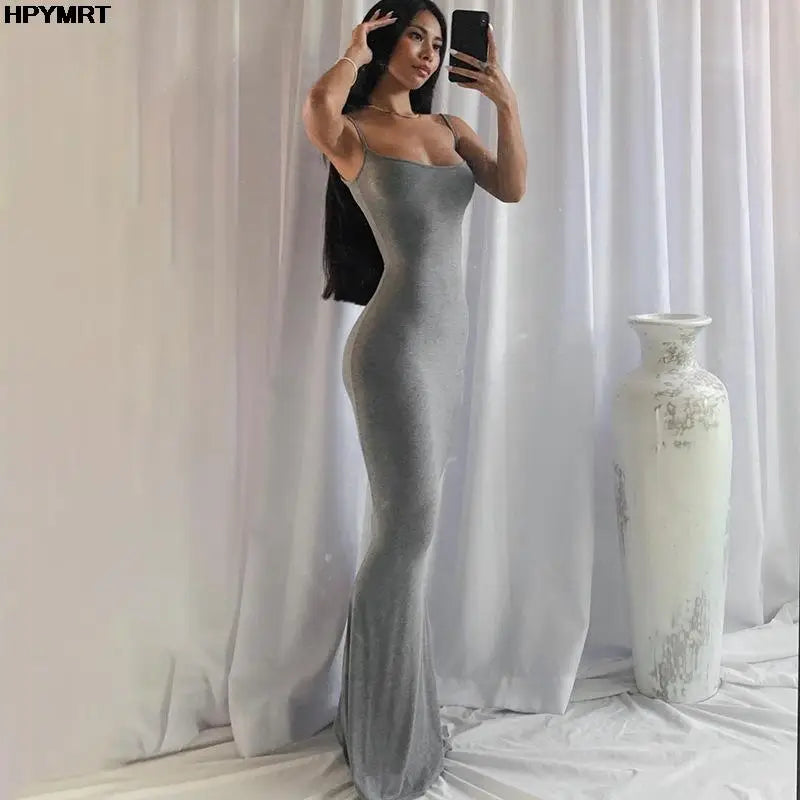 Adult model wearing the gray Golden Hour Satin Slip Dress, full-length front mirror view