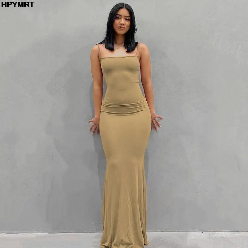 Adult model wearing the khaki Golden Hour Satin Slip Dress, full-length front view