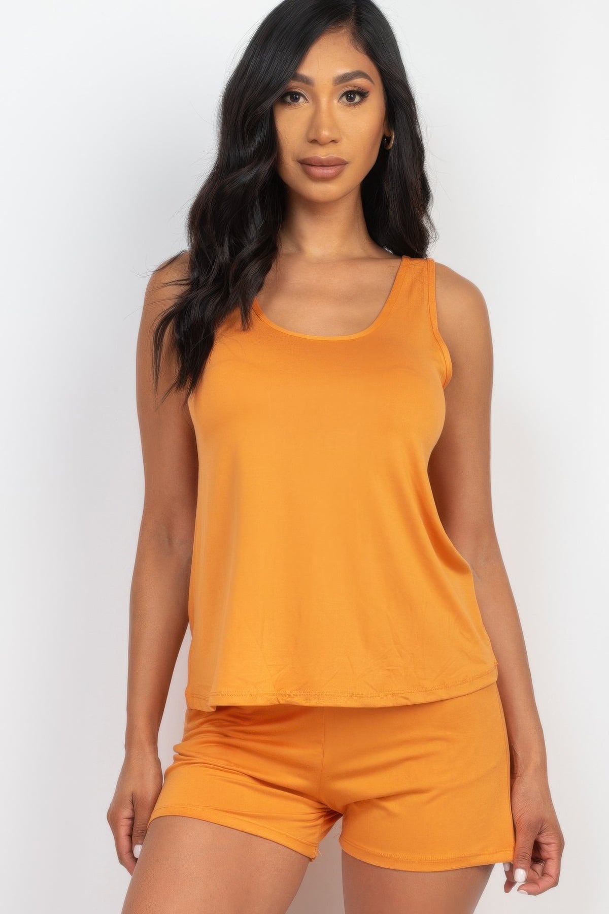 Adult model wearing the Mango Comfy Tank Top & Shorts Set with scoop-neck tank and pocketed shorts