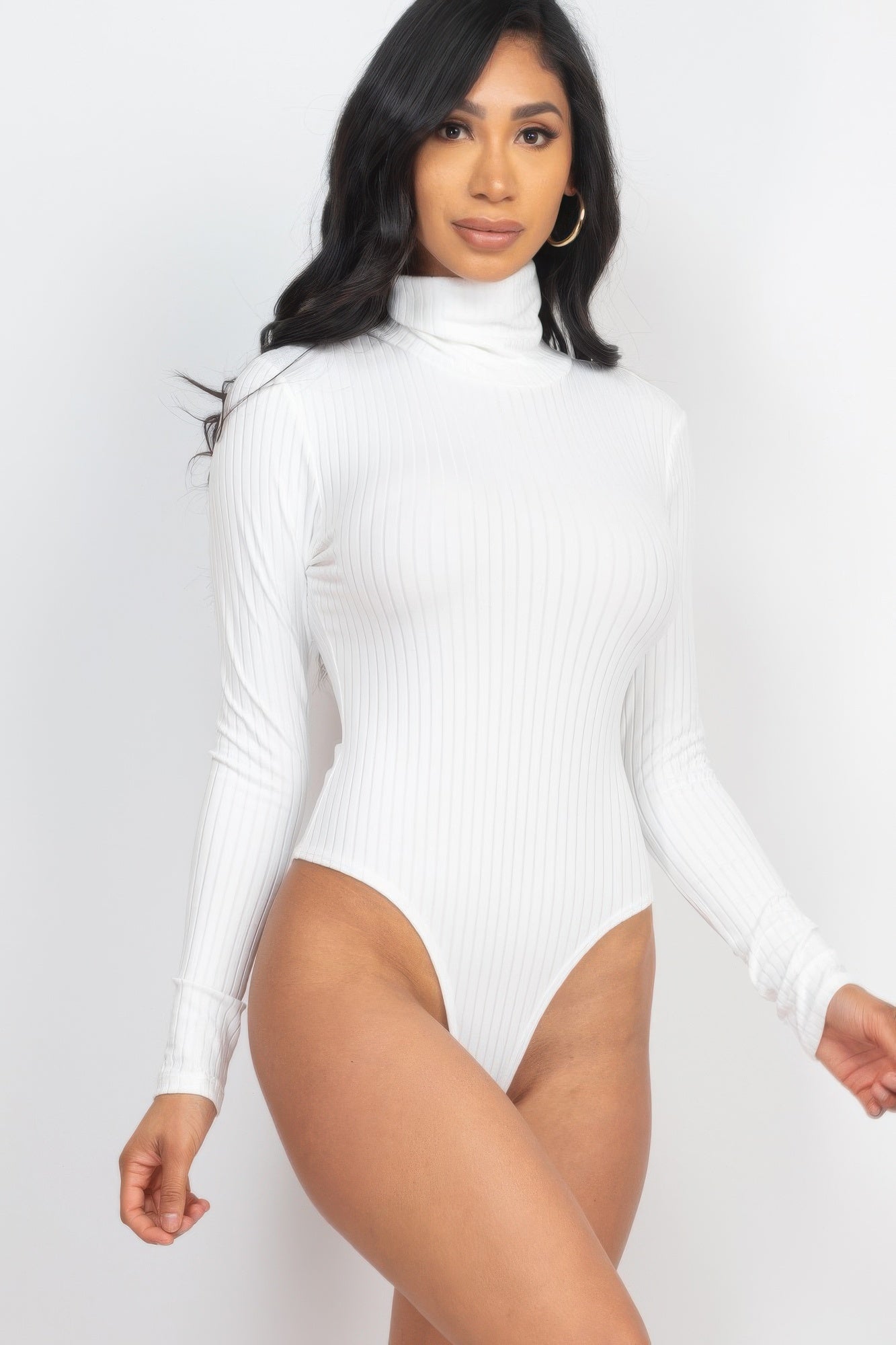 White Ribbed Turtle Neck Long Sleeve Bodysuit in an angled front view showing the folded neck and vertical ribbing