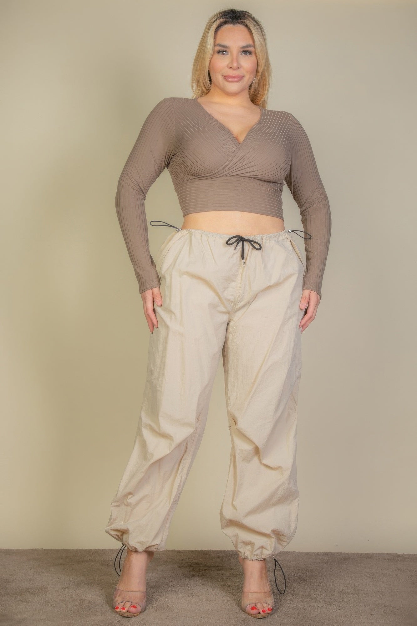 Taupe plus-size ribbed wrap-front long-sleeve crop top, straight-on view
