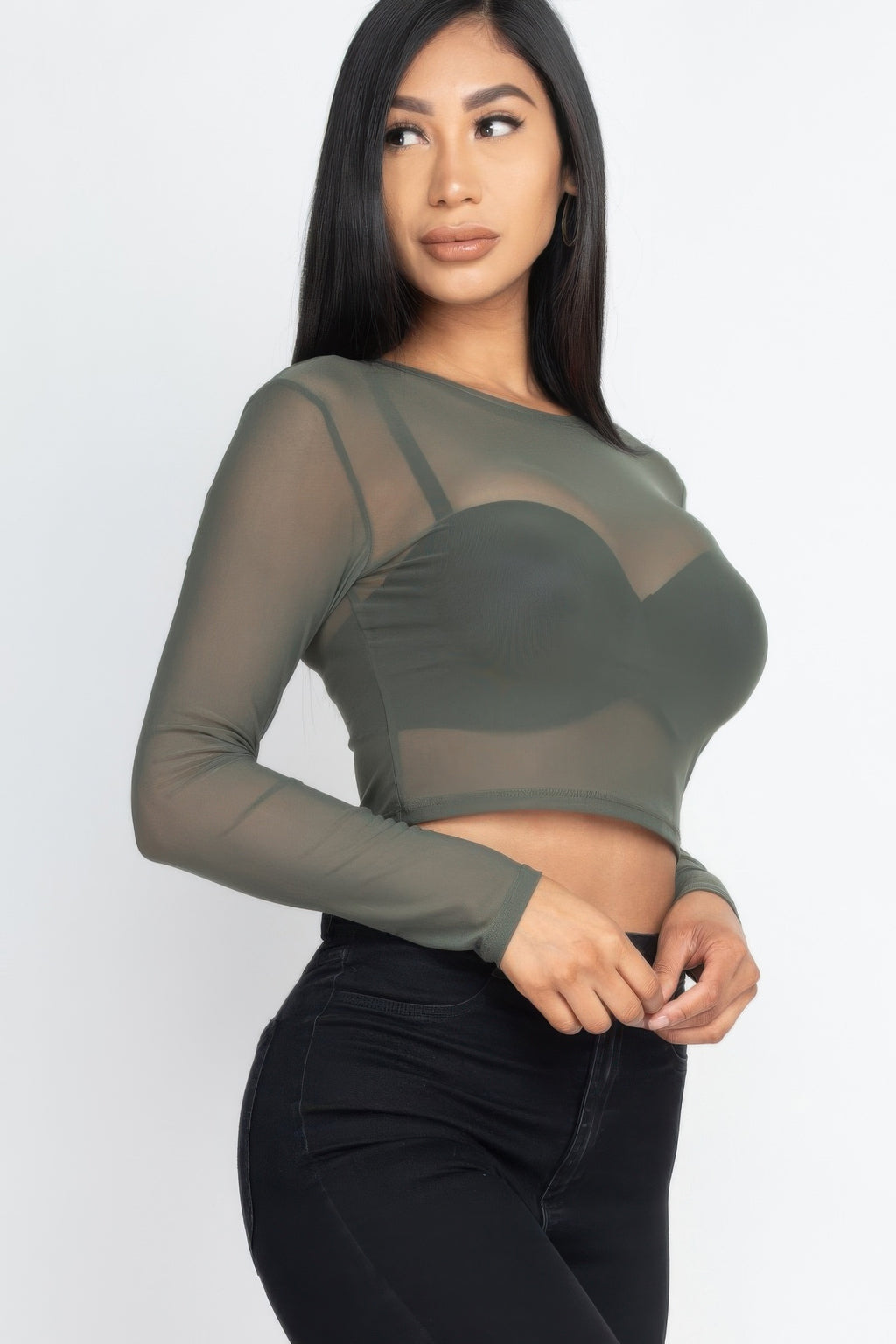 Olive After Dark Sheer Mesh Crop Top, angled front view with long fitted sleeves