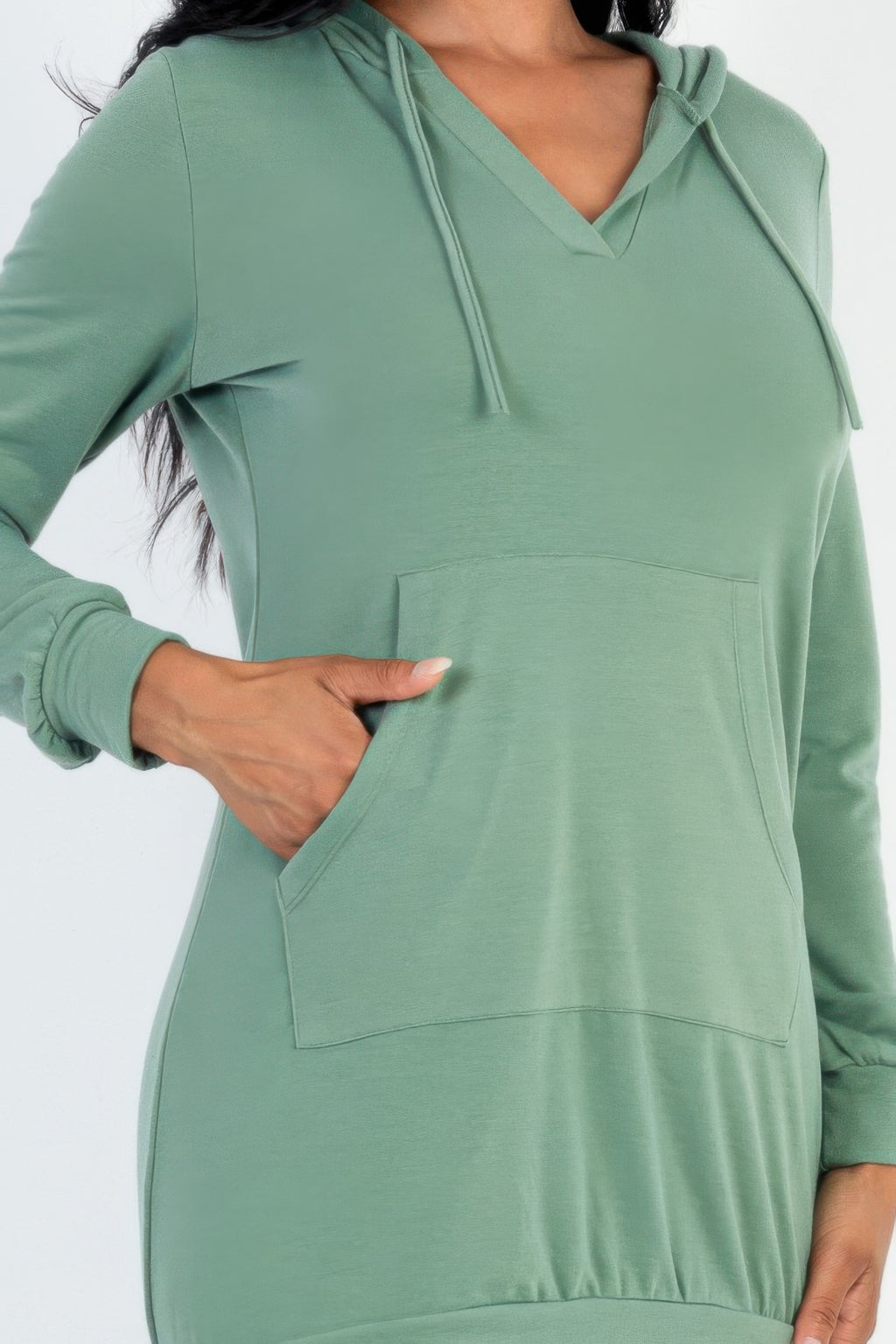 Close-up of the fern hoodie dress V-neck, drawstrings, cuffs, and kangaroo pocket