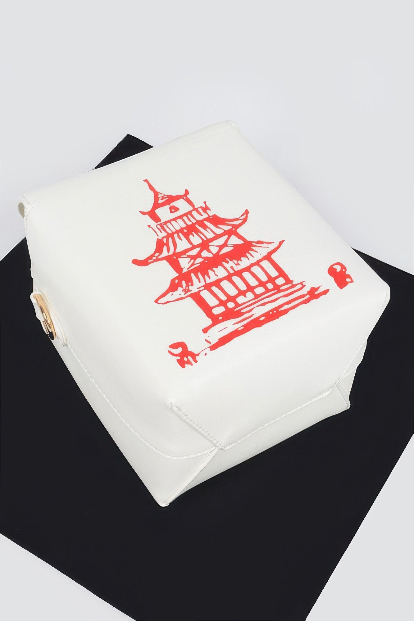 White Chinese To Go Box Clutch bottom view showing folded construction